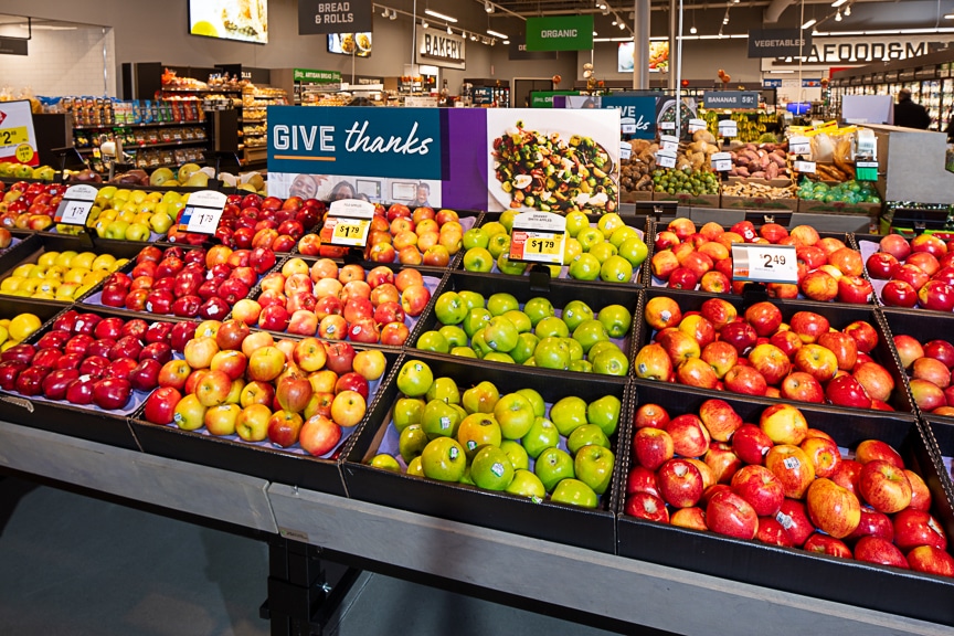 Apples in produce department at giant grocery store near scout Fairfax luxury apartments