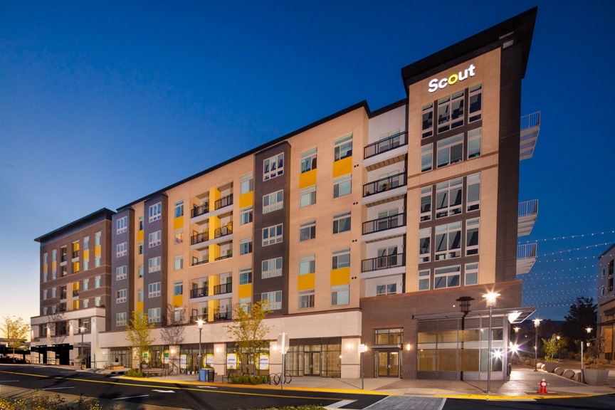 exterior of 6 story luxury apartment building with retail on the ground floor in fairfax va